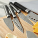 Image 2 of BergHOFF DiNA Codon Stainless Steel Santoku Knife with Holes, 5"